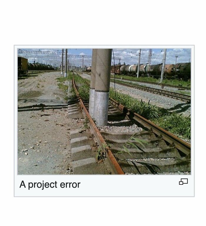 Railway track with a pole mistakenly placed between rails project error