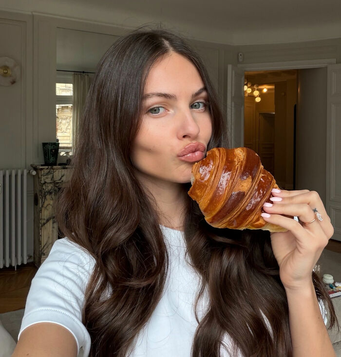 Thylane Blondeau, the 'most beautiful girl in the world,' pouts with a croissant.