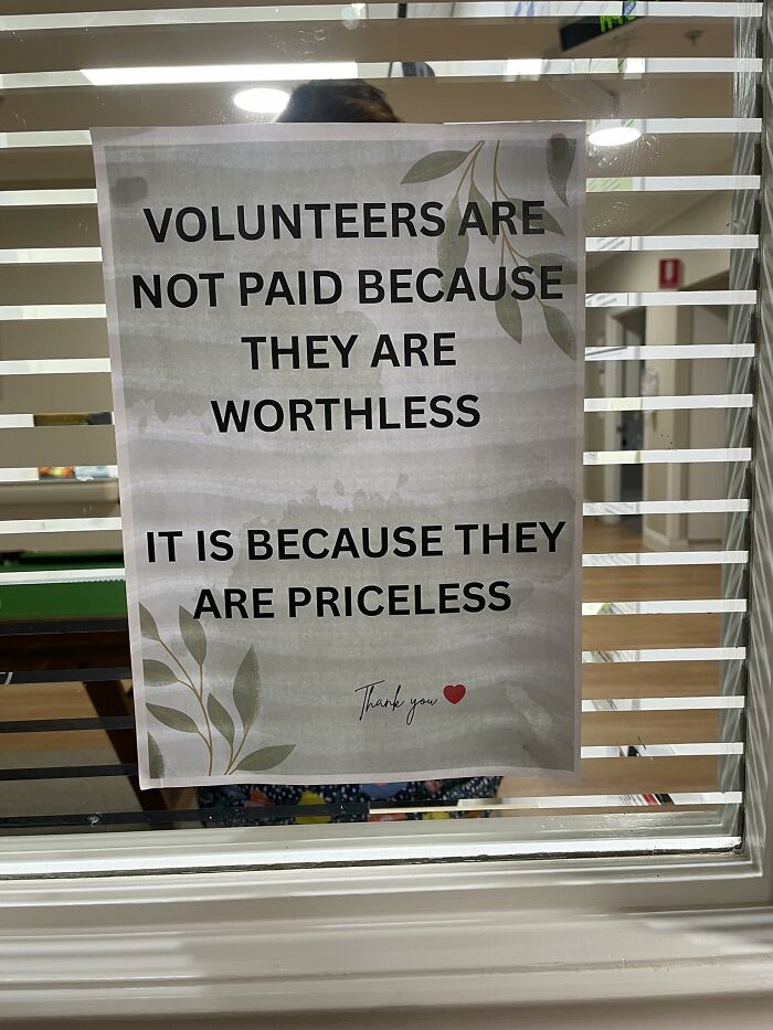 Motivational volunteer sign about priceless value of volunteers positive stories