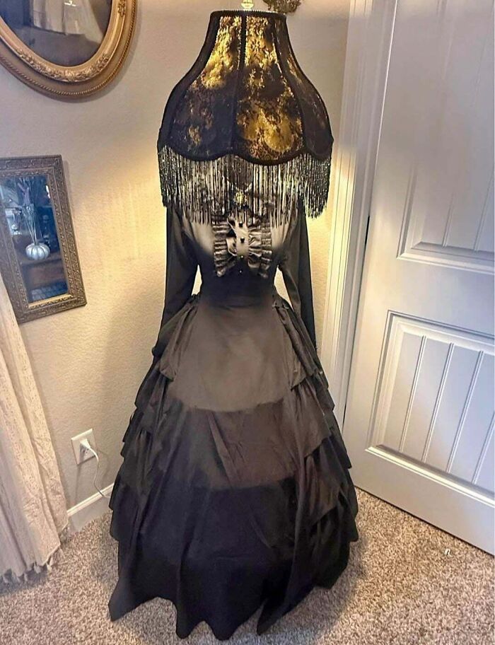 Victorian style dress lamp creating an oddly terrifying illusion