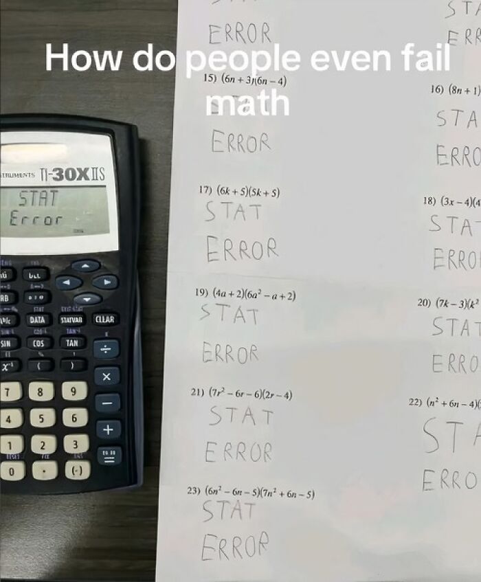 Humorous math test with calculator showing STAT error message