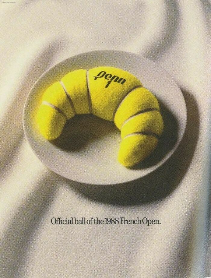 Tennis ball shaped as croissant on plate showcasing creative design