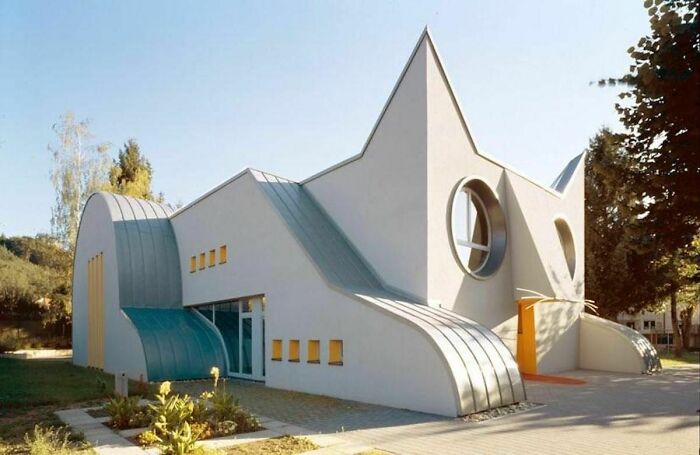 Modern creative architecture shaped like a cat with unique geometric design