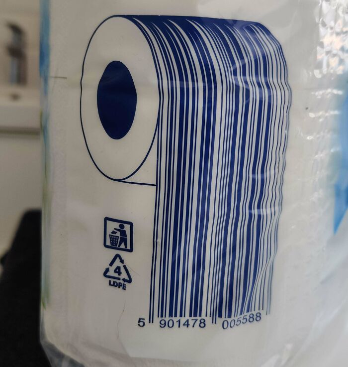 Toilet paper packaging with barcode shaped like a toilet paper roll showing designer genius