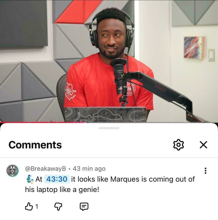Screenshot of man in podcast studio with comment about Marques coming out of laptop like genie