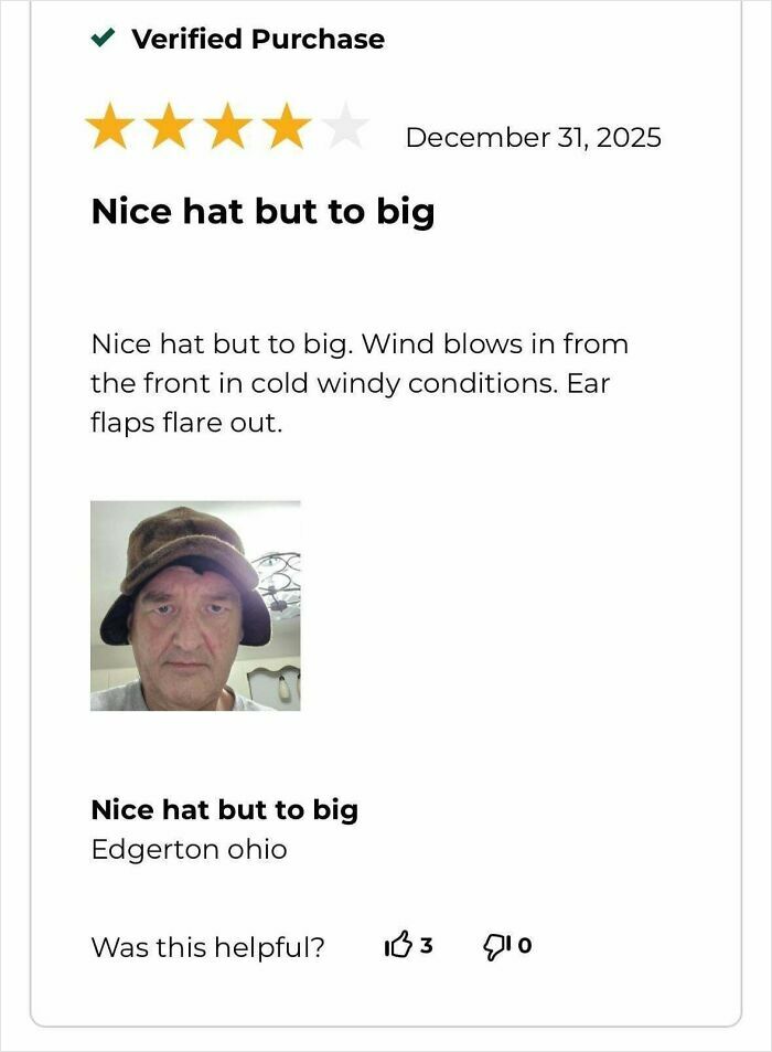 Funny online reviews: A man wearing an oversized hat, illustrating a funny review about the fit.