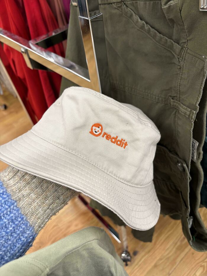 Beige bucket hat with Reddit logo found while thrifting