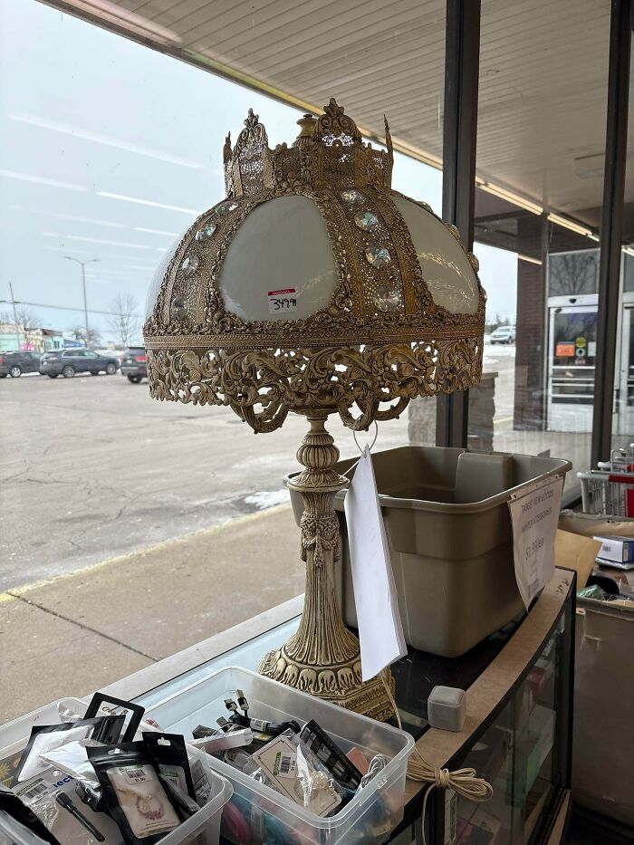 Vintage ornate table lamp with jeweled shade at thrift store priced 349.99