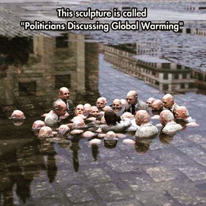 Sculpture titled politicians discussing global warming showing figures submerged in water