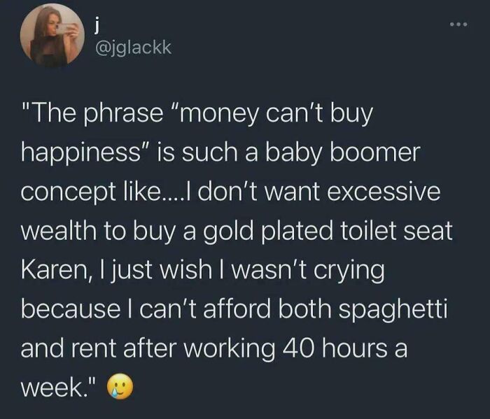 Tweet criticizing the phrase money can't buy happiness in context of capitalism struggles