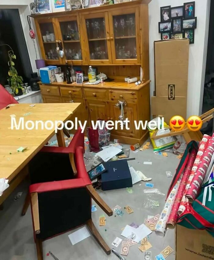 Messy room after Monopoly game with scattered money and chairs