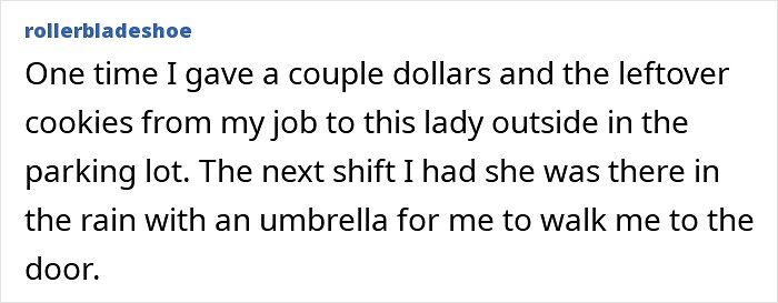 Homeless lady in parking lot shows kindness by sheltering from rain with umbrella