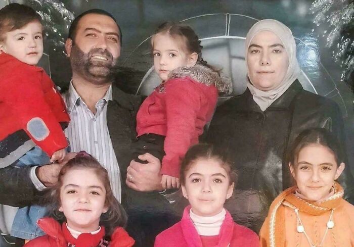 Family group portrait with serious expressions related to real horror stories