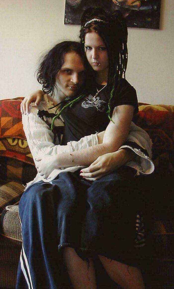 Couple with gothic appearance sitting together horror story