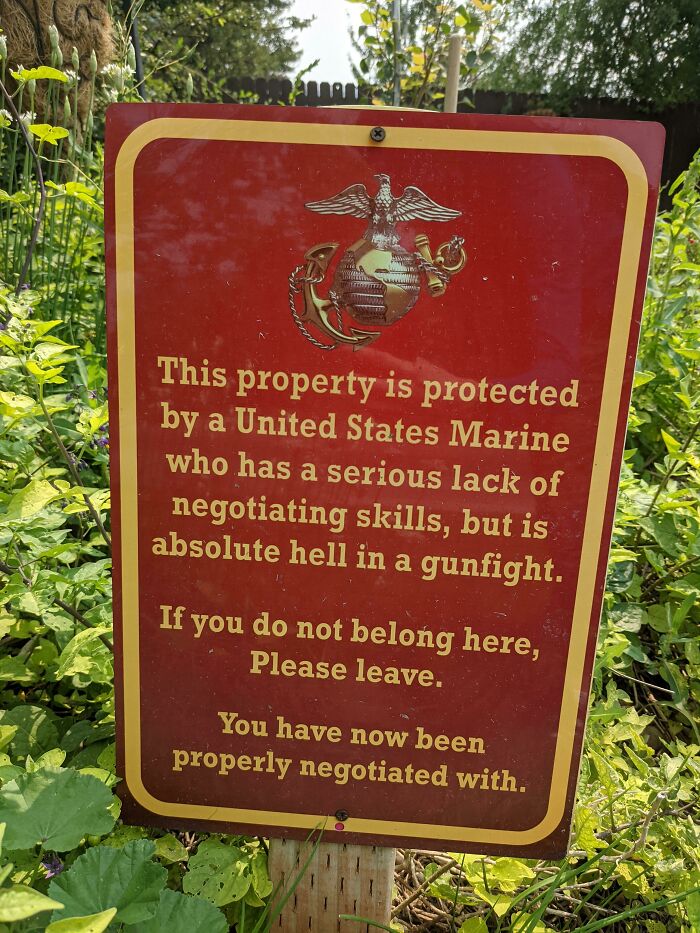 Sign warning trespassers of a tough United States Marine protecting property