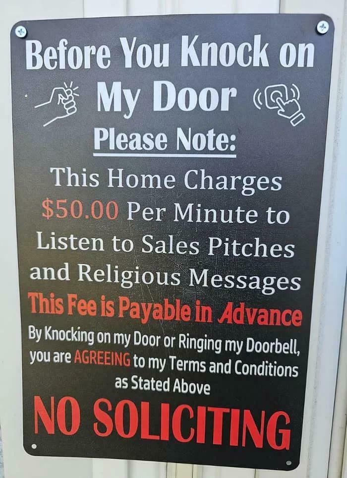 No soliciting sign humorously charging 50 dollars per minute for sales pitches and religious messages