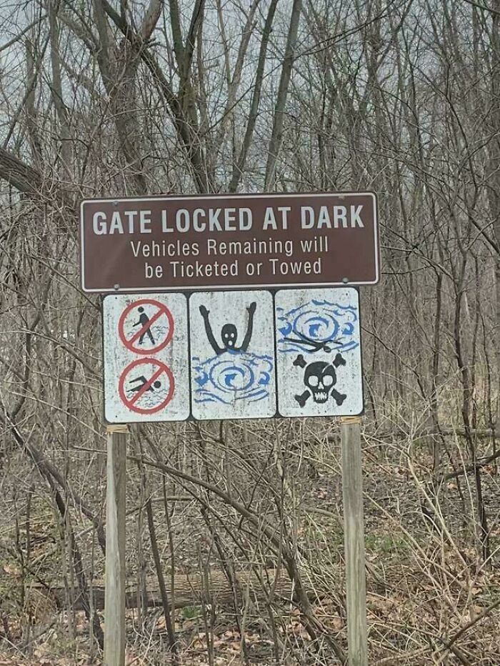 Funny gate locked at dark sign warning ticket or tow with cartoon hazard icons