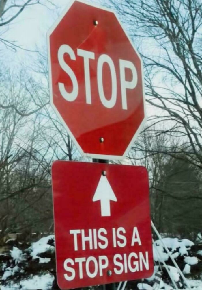 Funny stop sign with additional sign stating this is a stop sign