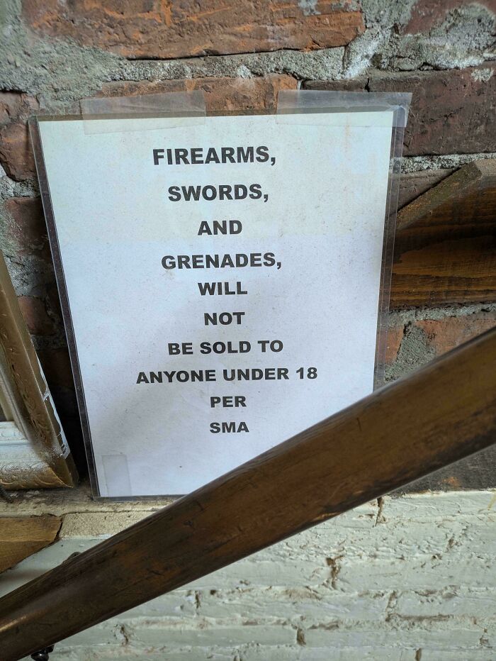 Sign banning sale of firearms swords and grenades under 18