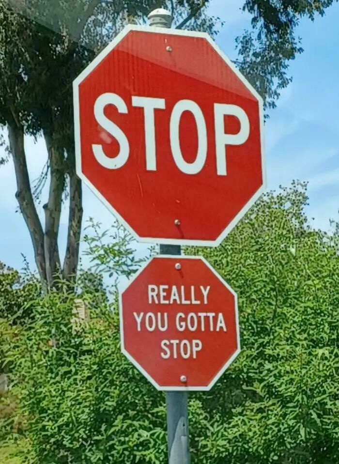 Humorous stop sign with extra message you gotta stop