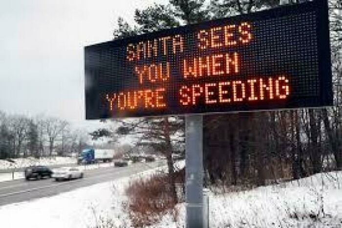 Electronic road sign warns Santa sees you when speeding