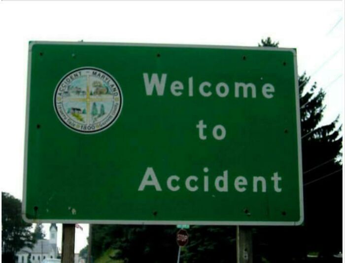 Green welcome road sign for the town named Accident in Maryland