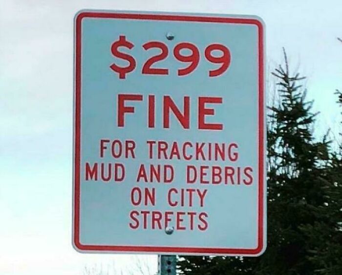 Funny fine sign warning $299 fine for tracking mud on city streets