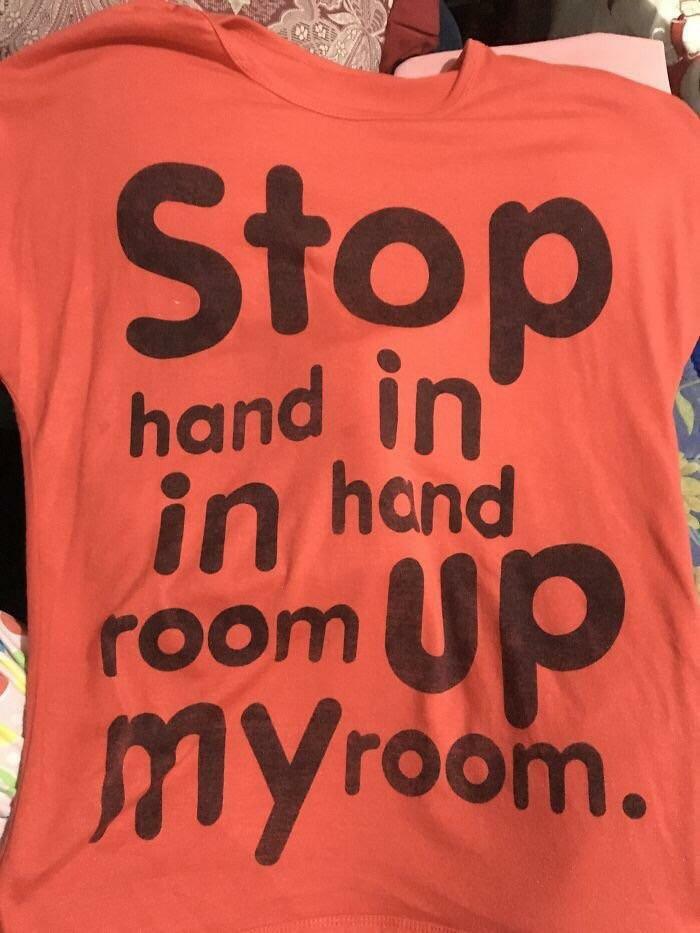 An orange t-shirt with poorly arranged, nonsensical text. An example of bad clothing designs.