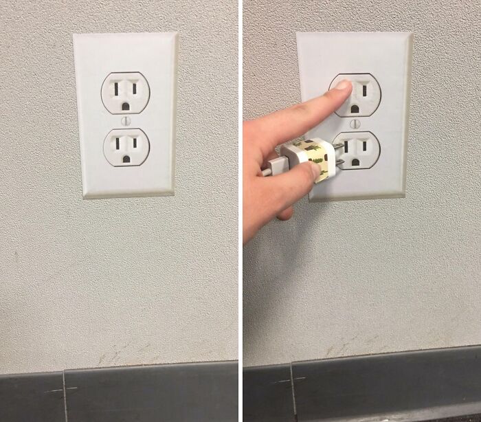 A hand attempts to plug a small charger into a high airport outlet, showing the chaotic side of airports.