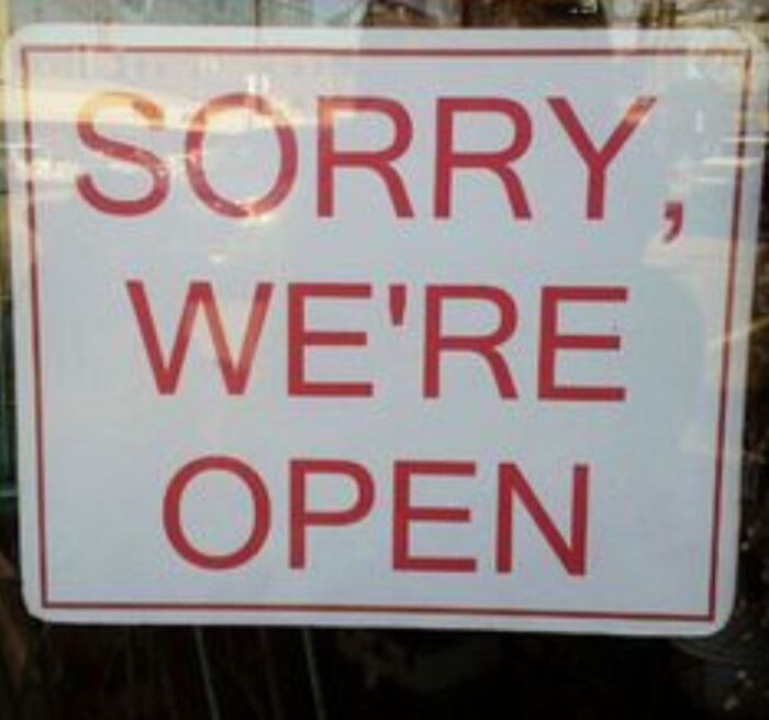 Humorous business sign says sorry were open