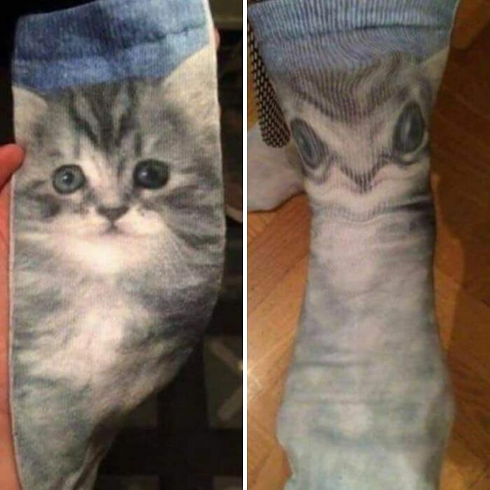 A sock with a kitten face, looking distorted when worn, highlighting bad clothing designs.