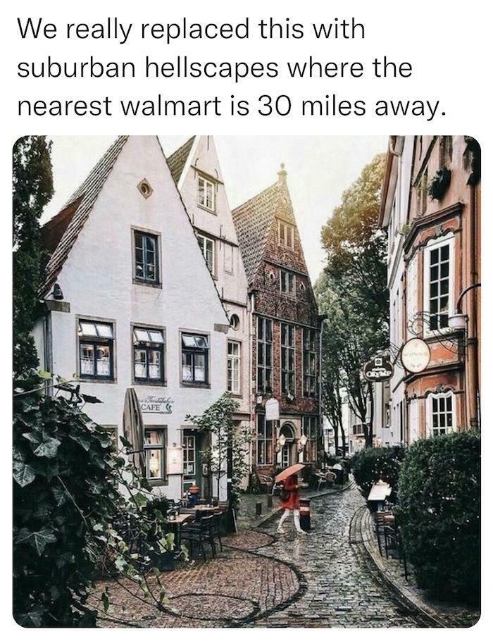 Contrast of charming European street with old buildings and text about suburban hellscapes far from Walmart