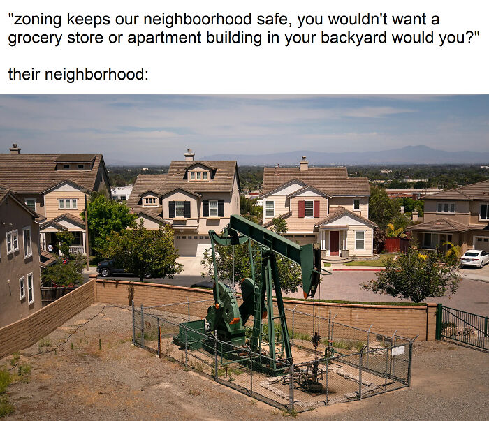 Oil pump jack in the middle of a suburban neighborhood illustrating zoning issues