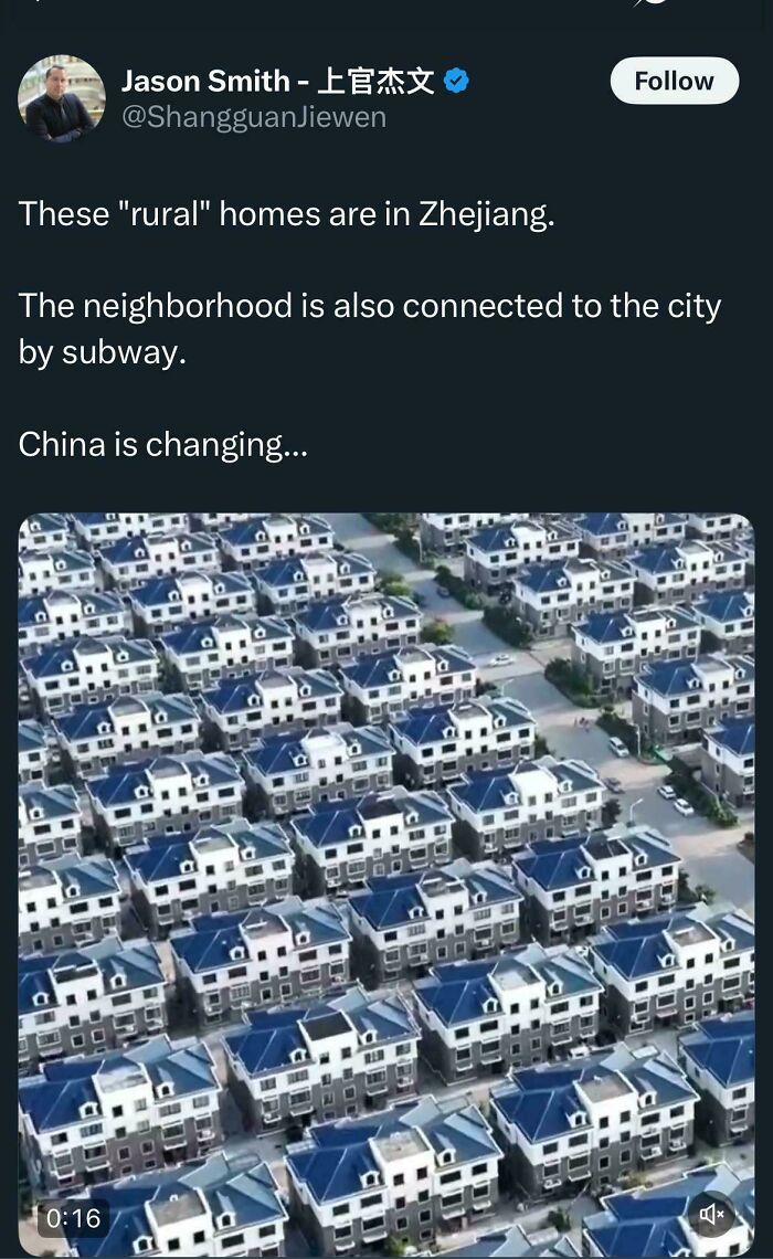 Suburban hell aerial view of rural homes in Zhejiang China showing uniform houses