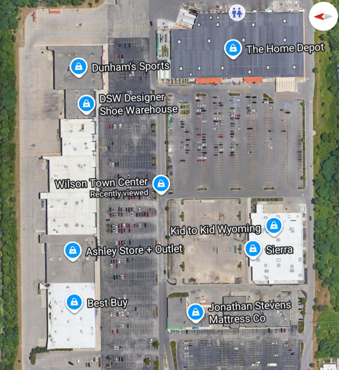 Top view of Wilson Town Center shopping plaza with labeled stores and parking lots