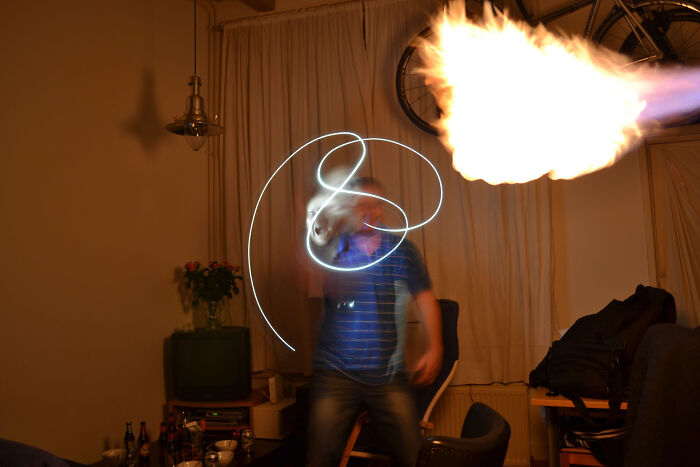 Funny fail with person breathing fire indoors and light trails