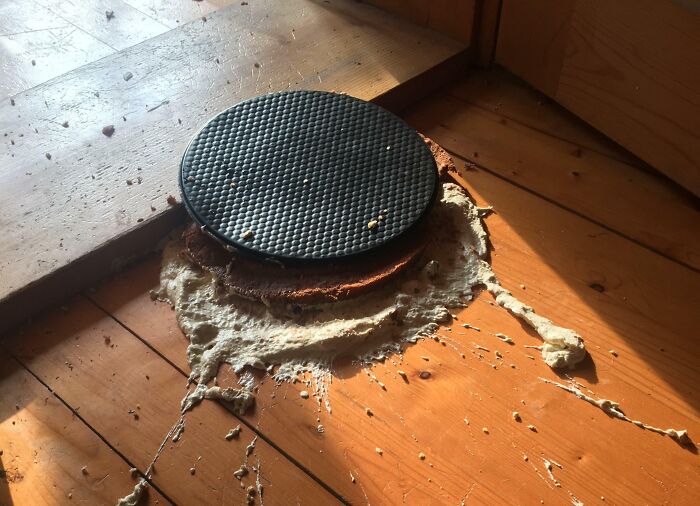 Funny fail with stove burner leaking expanding foam onto wooden floor