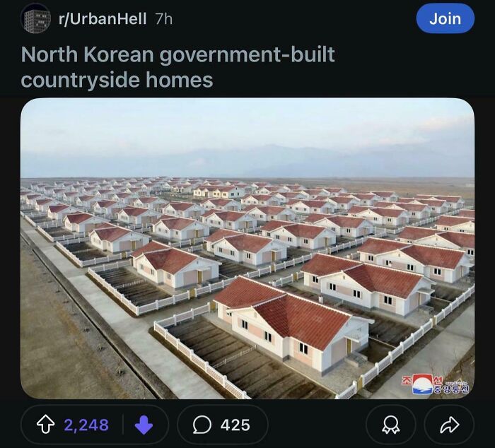 North Korean government-built countryside homes with uniform red roofs in rows