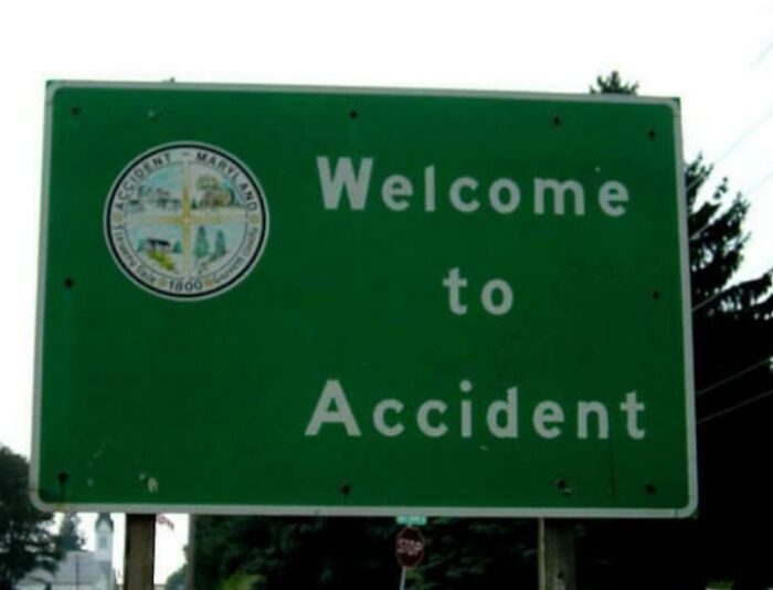 Green welcome road sign for the town named Accident in Maryland