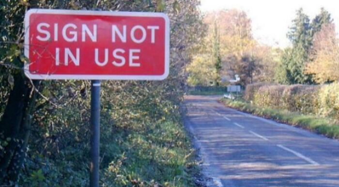 Ironical road sign stating sign not in use