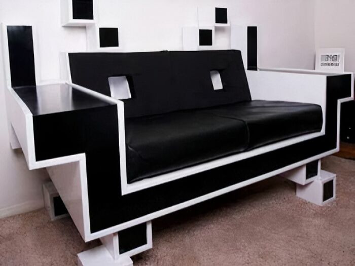 An artistic couch with a painted figure reclining on it, a unique design for interior designers.