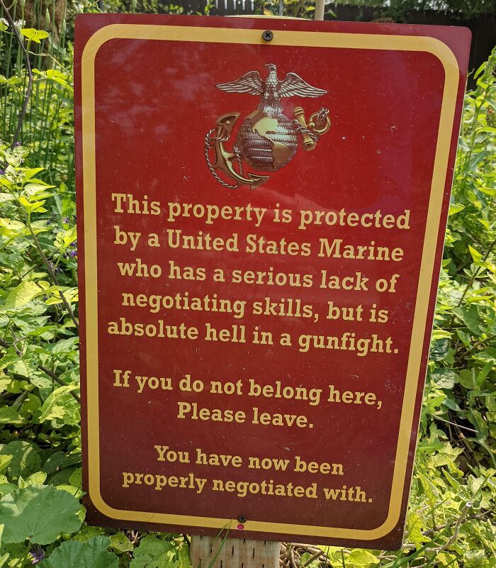 Sign warning trespassers of a tough United States Marine protecting property