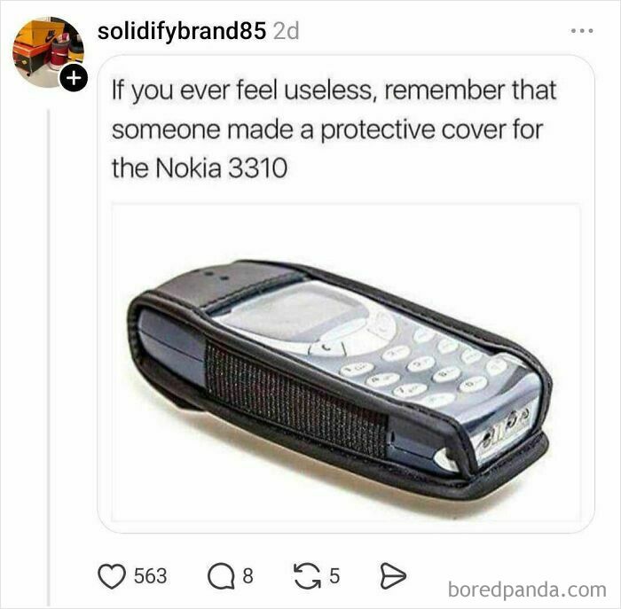 Nokia 3310 phone in a protective case with a humorous nostril caption
