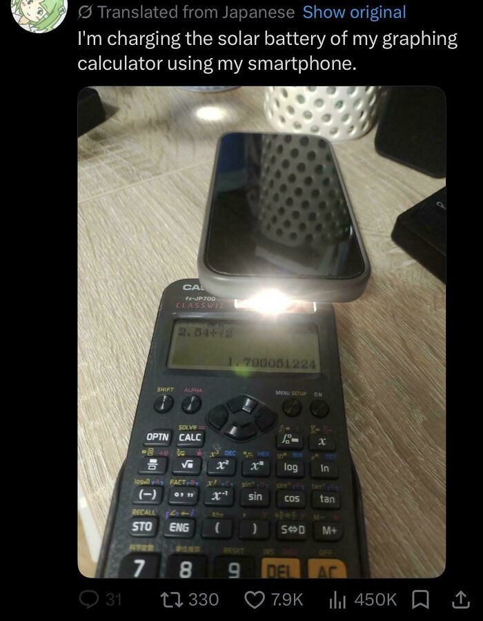 A funny, unpredictable sentence: a smartphone flashlight charging a graphing calculator's solar battery.