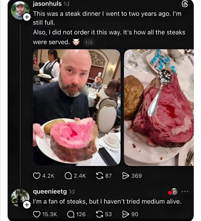 A man holds a very rare steak, called medium alive in the comments, an unpredictable sentence.
