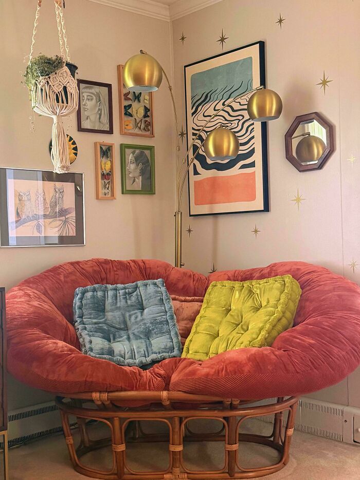 Vibrant home decor projects featuring a cozy red papasan chair, unique wall art, and a stylish gold floor lamp.