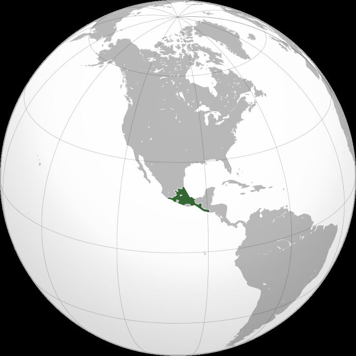 A globe highlight map showing the geographical region of Mesoamerica in green