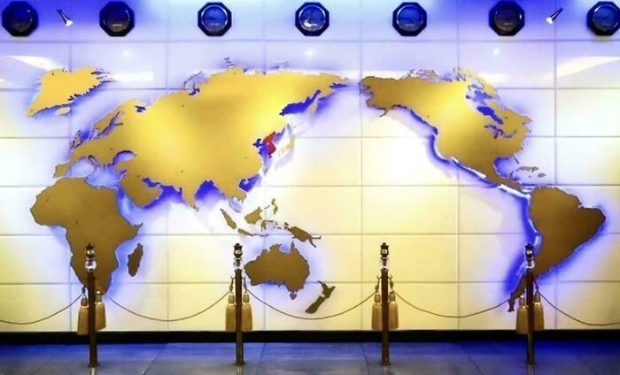 A wall map showing an interesting world perspective with Korea highlighted