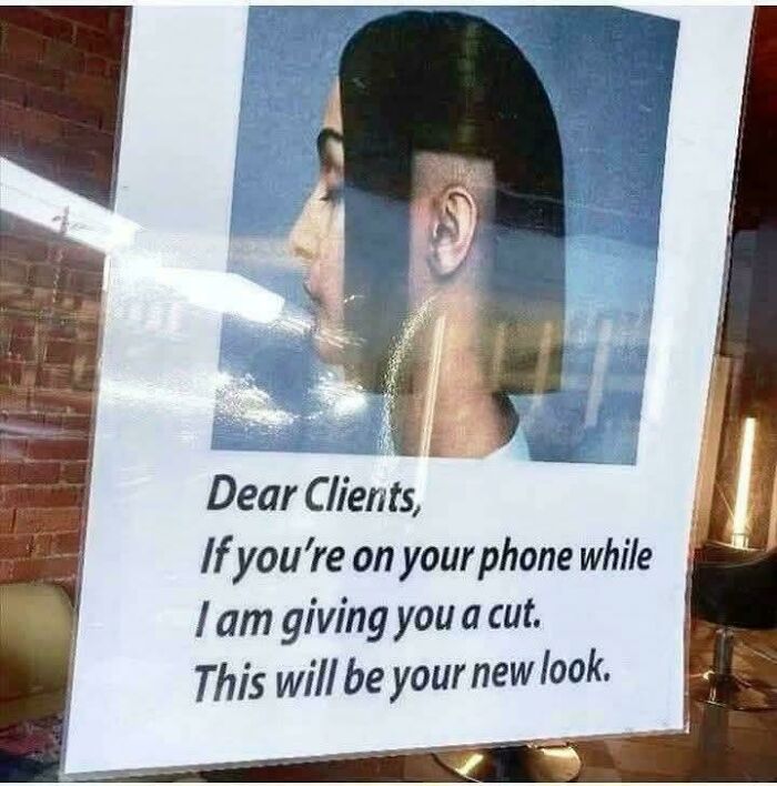 A sign in a salon window showing a woman with a half-shaved head, warning clients about bad hair day consequences.
