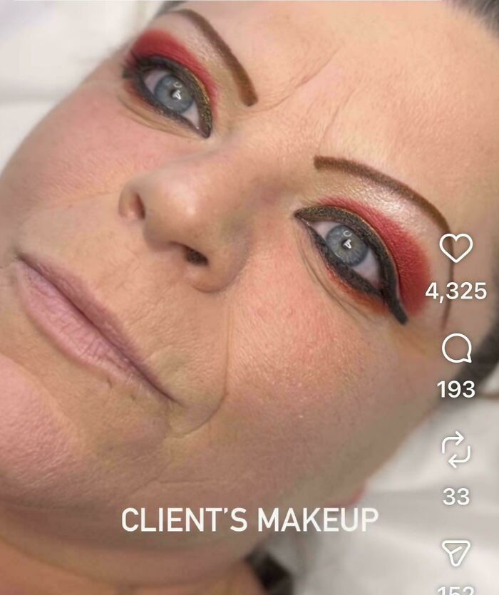 A woman with exaggerated red and black eye makeup from a beauty salon, looking significantly worse.